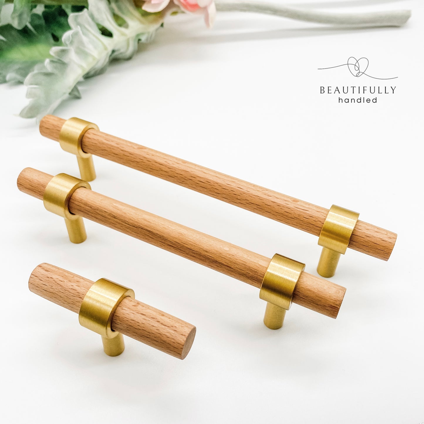 light timber drawer handles with brass feet