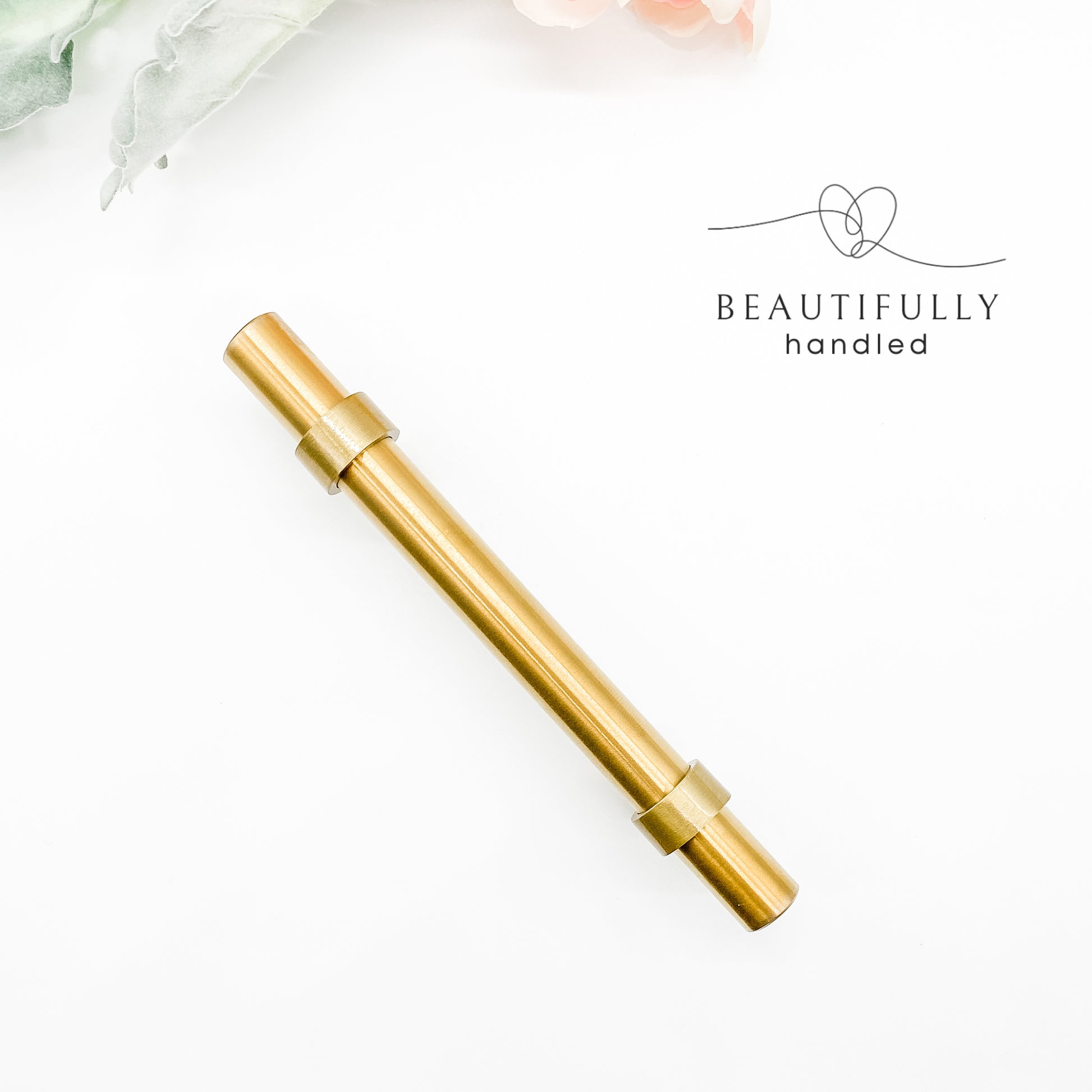 96mm brass gold slimline handle from top angle on plain white background