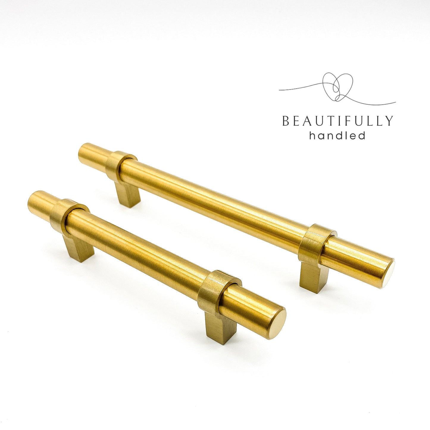 2 brass gold slimline drawer handles showing 96mm and 128mm on plain white background