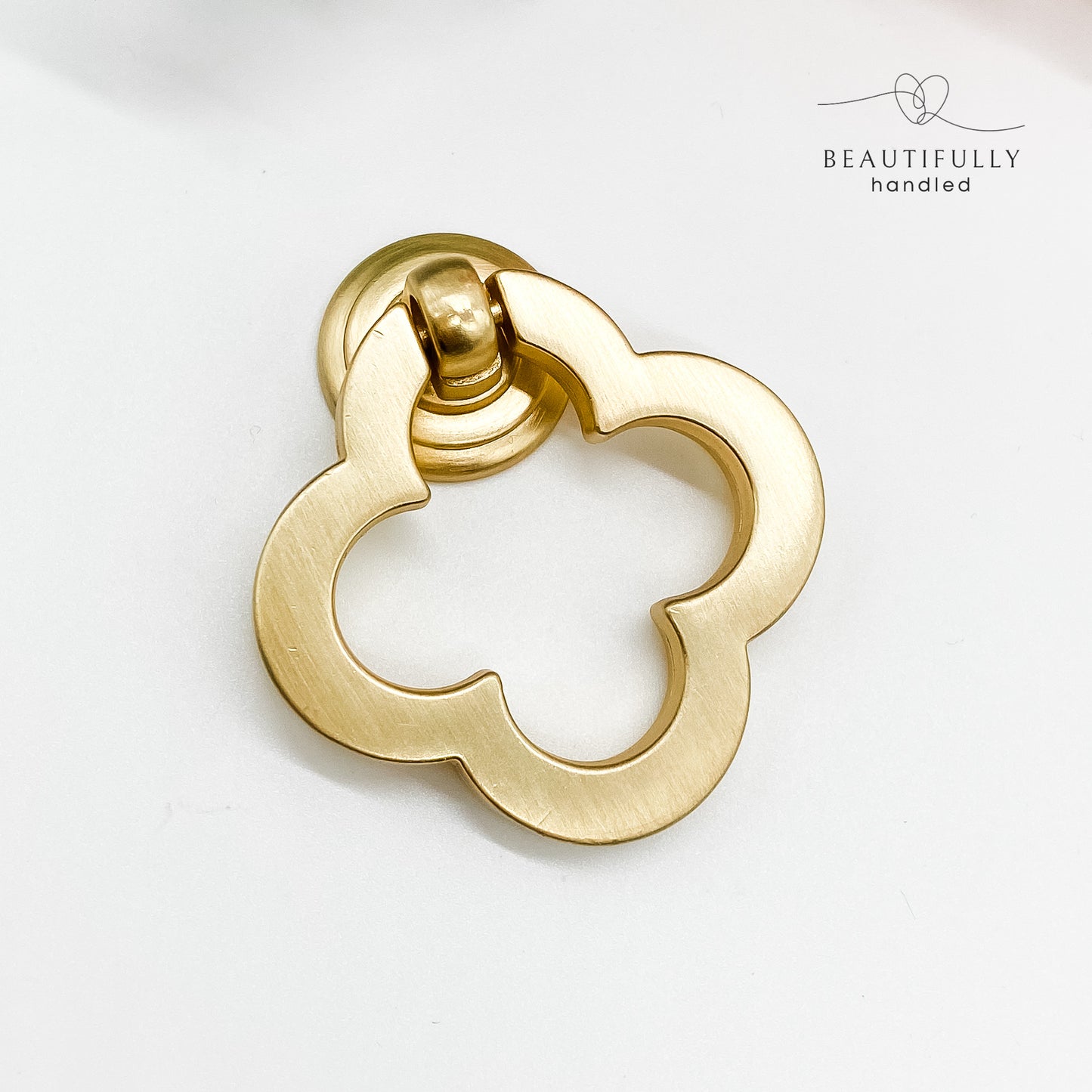 Brushed gold clover leaf drop pull handle