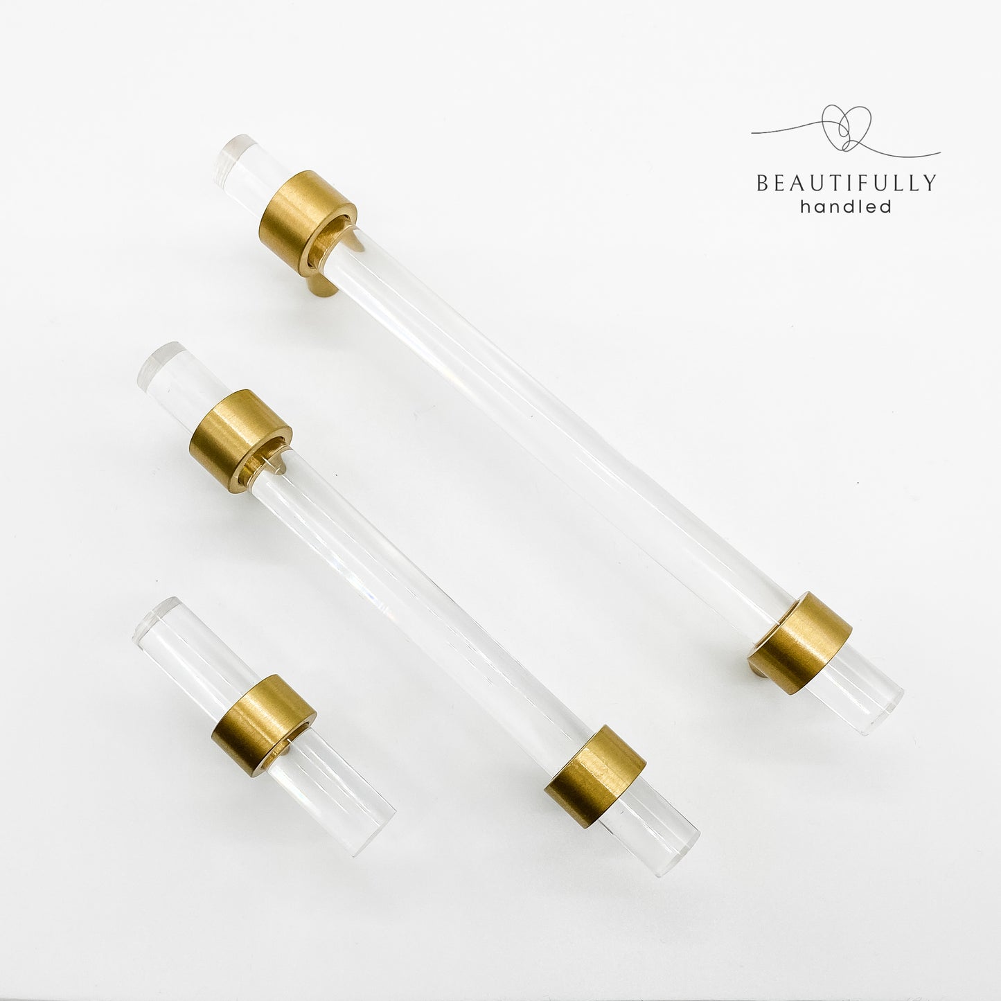 clear drawer handles with brass feet 