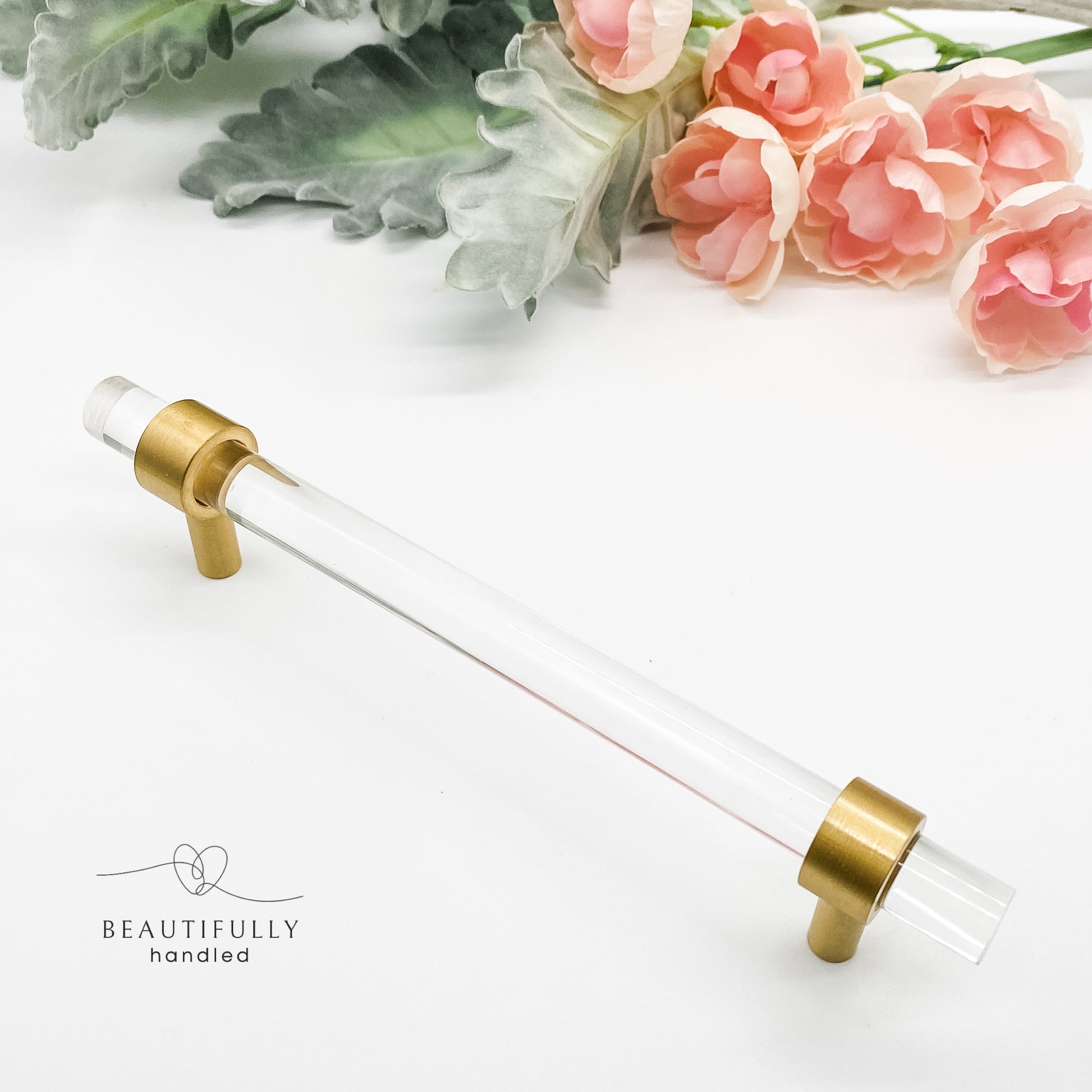 clear drawer handle with gold clasps