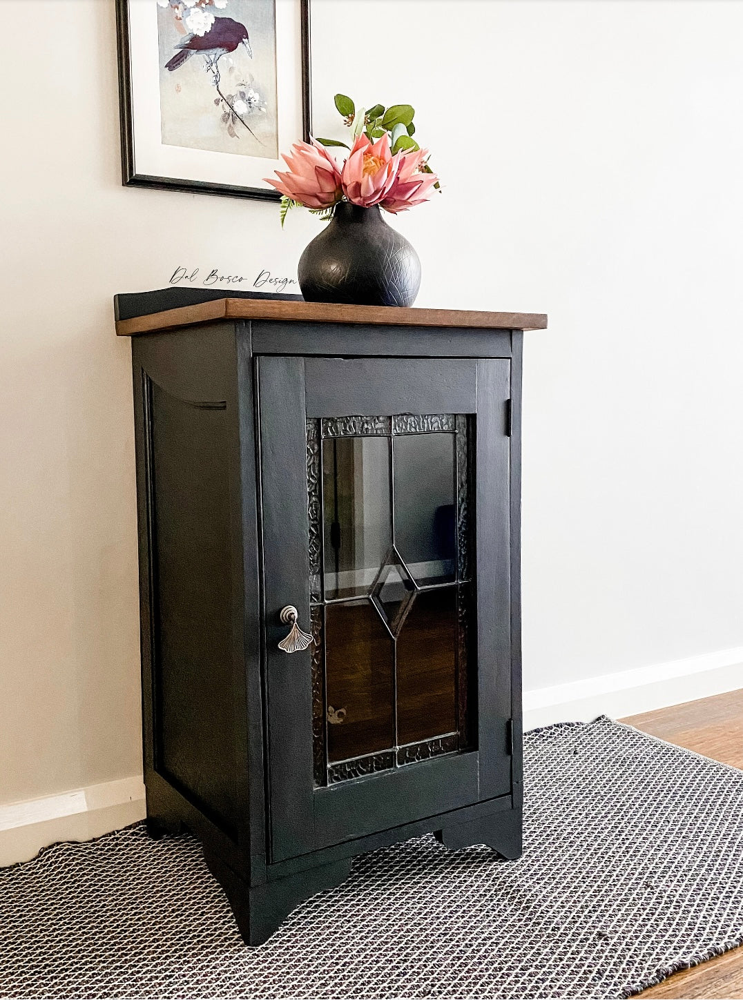 black painted glass cabinet with walnut stained top and dark silver gingko leaf drawer handle 