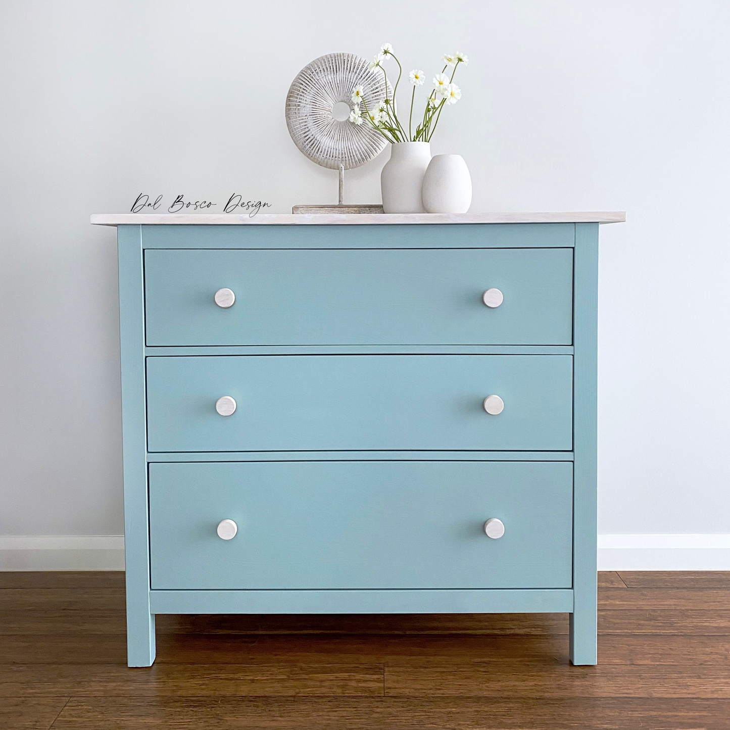 ikea hemnes 3 drawer dresser painted blue with whitewashed top with round wooden drawer knobs