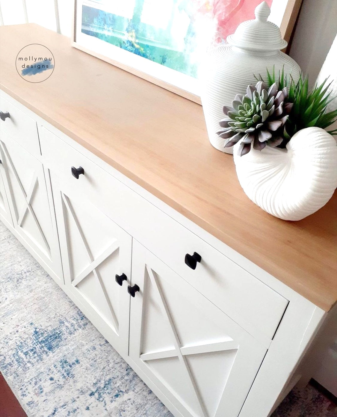 top angle of coastal white buffet with oak top and square shaped black hamptons style drawer handles