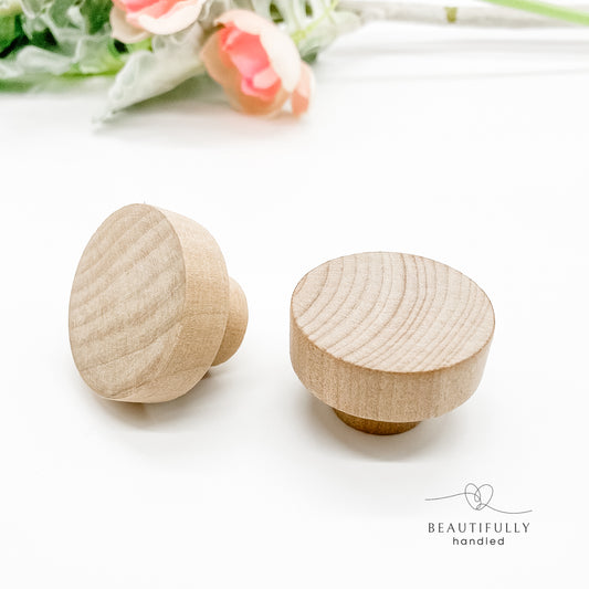 unfinished raw wooden drawer knobs 40mm on plain white background