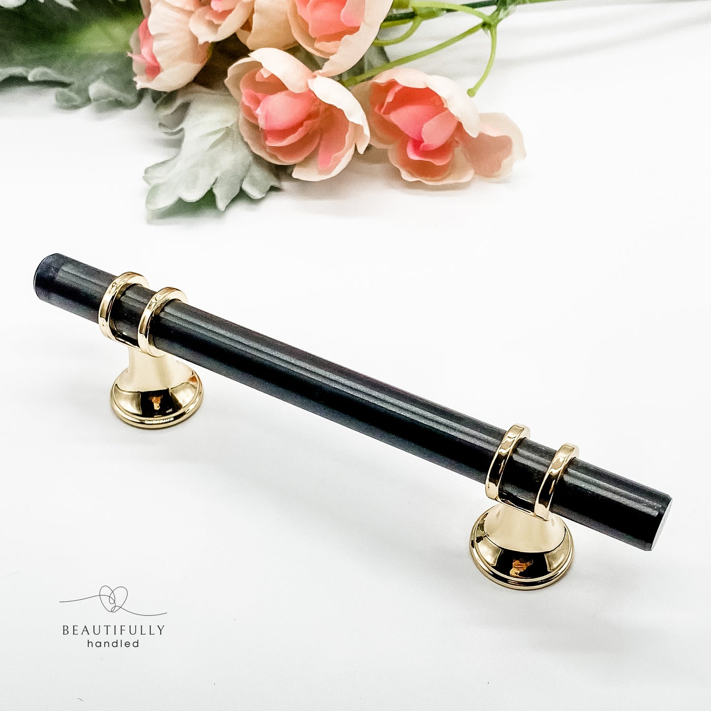 96mm black and gold handle on white background 