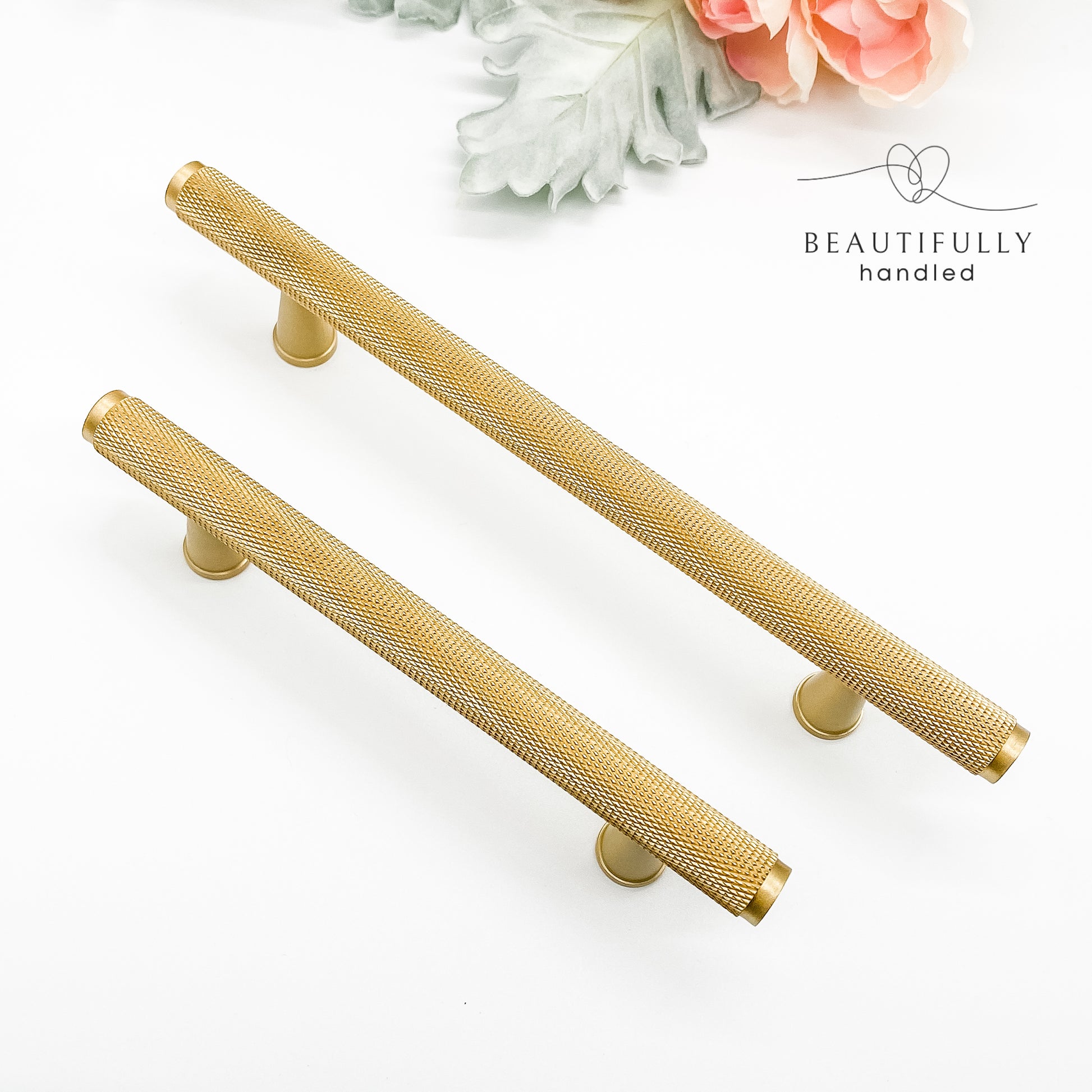 96mm and 128mm solid brass knurled kitchen drawer handle on plain white background