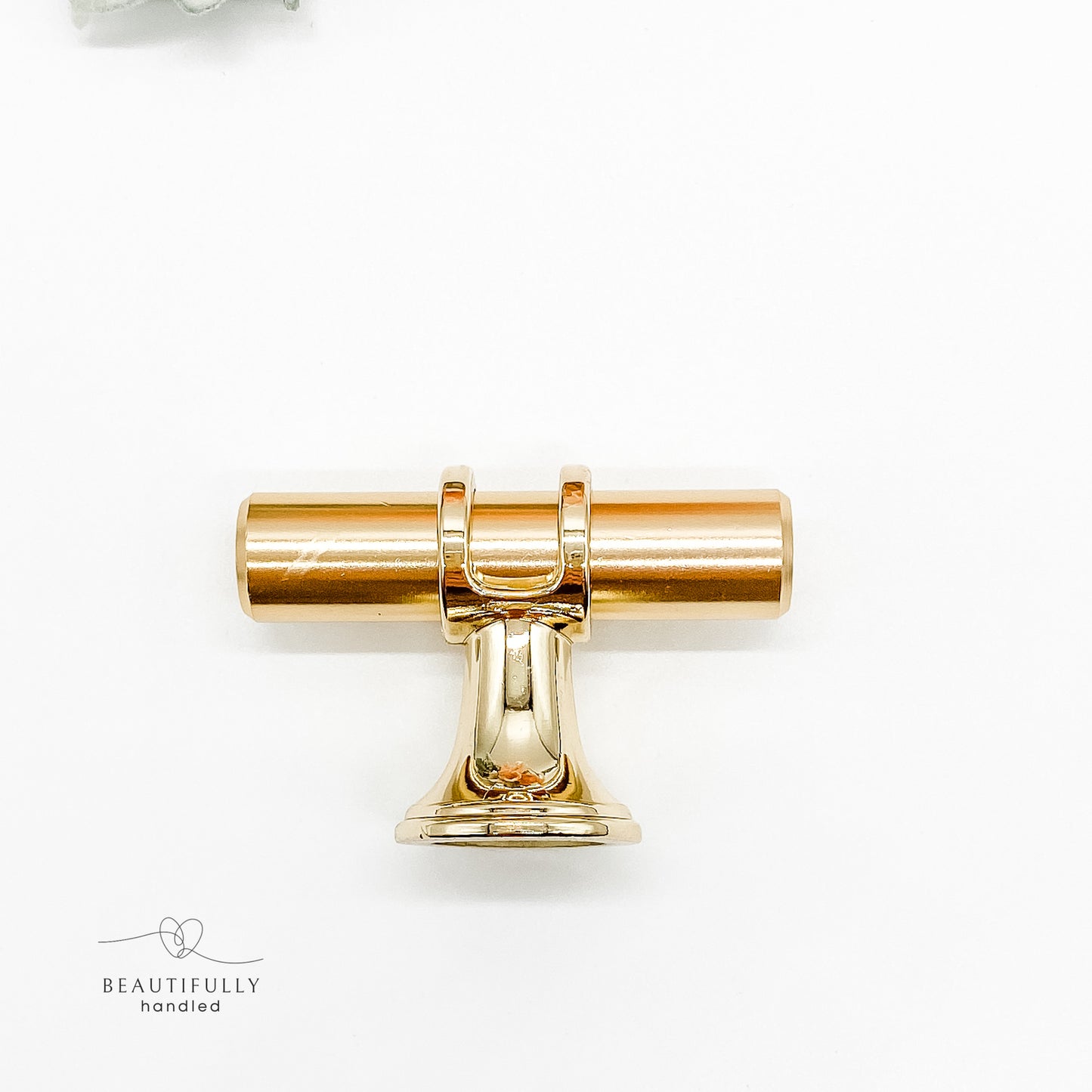 gold drawer handle 5cm on plain white background 